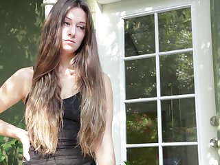 Alluring long hair babe with natural tits giving cock blowjob