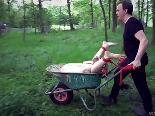 RedHead Dragged In Woods Punished with Wax and Big Masturbation Toy