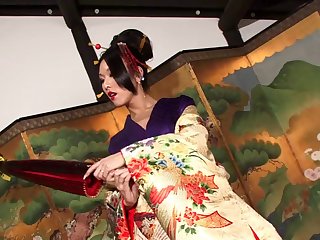 Traditional Japanese shemale strokes her pecker with ultimate passion