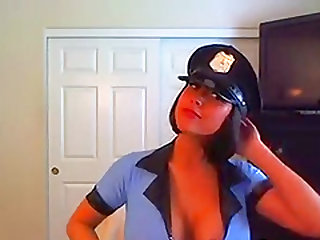 Busty police woman stripteasing and showing her big fleshy melons
